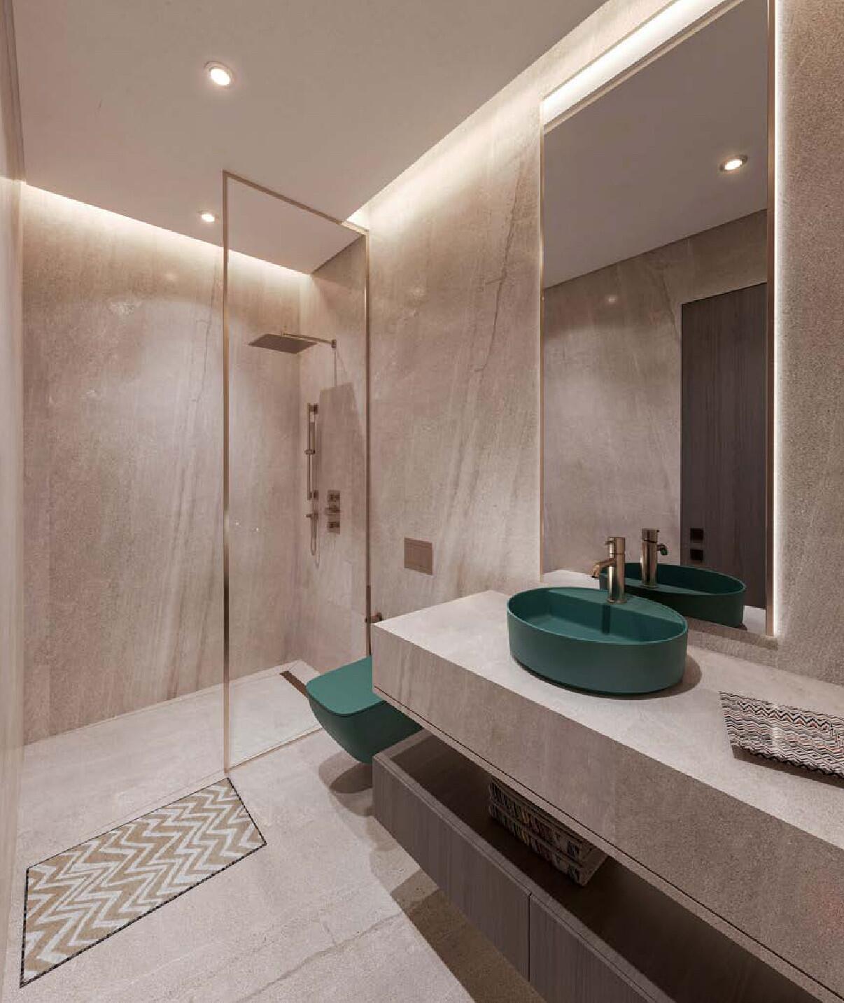 Luxury bathroom with marble finishes and coastal accents